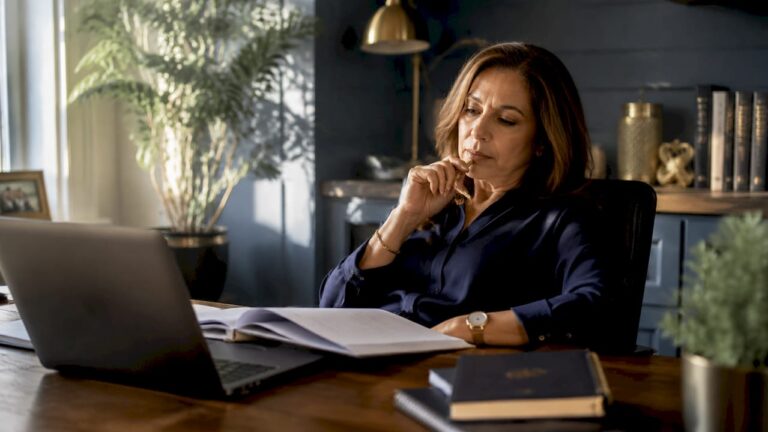Mid-market owner overwhelmed at desk